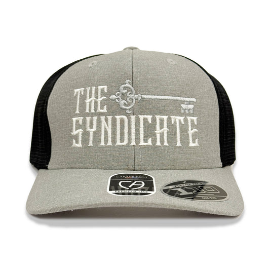 Heather gray and white trucker snapback hat with 'THE SYNDICATE' text on the front.