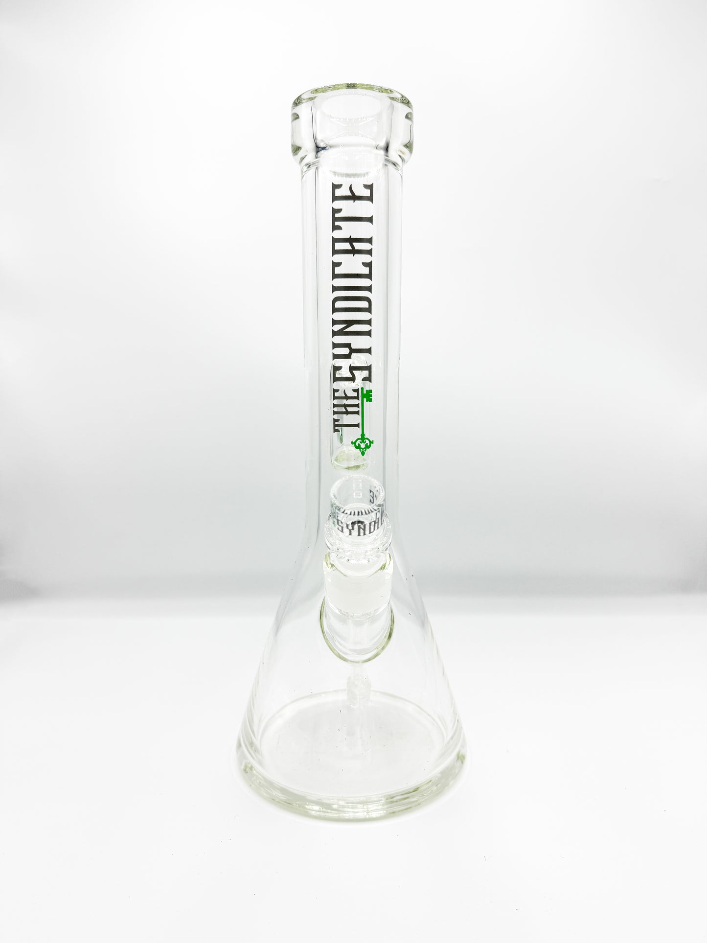 A clear glass bong with a beaker bottom and a peculator down stem. The bong has branding text on it, and it's designed for smoking.