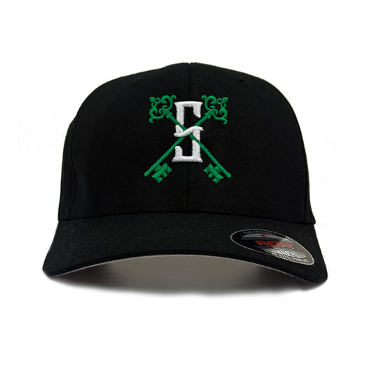A black flexfit hat with a green logo featuring keys and a letter 'S'. With Ket X logo behind